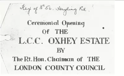 Label from ceremony when keys to first house were handed over