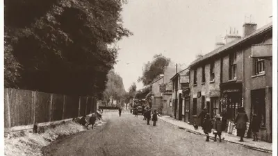 Abbots Langley showing shops old bus pub people in street